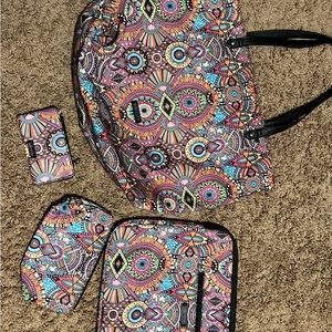 Sakroots bundle: tote purse, makeup bag, wallet and laptop case.